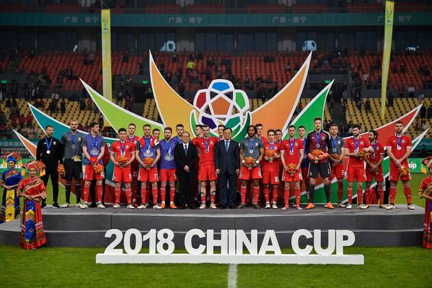 First runner-up Wales national football team take part in the award ceremony after being defeated by Uruguay national football team in their final match during the 2018 Gree China Cup International Football Championship in Nanning city, south China s Guangxi Zhuang Autonomous Region, 26 March 2018. Uruguay won the final by 1-0 against Wales and claimed the title of the event. Uruguay claims title of 2018 China Cup Int l Football Championship in Nanning  20180326_90114