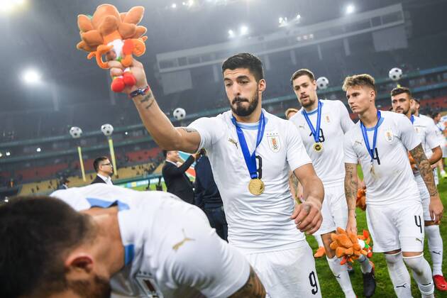Players of Uruguay national football team take part in the champion award ceremony for the 2018 Gree China Cup International Football Championship in Nanning city, south China s Guangxi Zhuang Autonomous Region, 26 March 2018. Uruguay won the final by 1-0 against Wales and claimed the title of the event. Uruguay claims title of 2018 China Cup Int l Football Championship in Nanning  20180326_53431