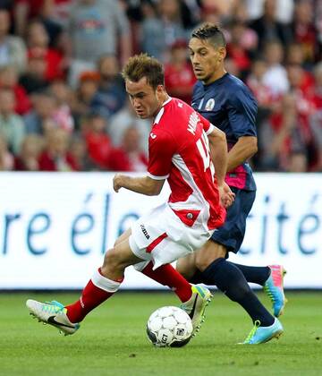- LIEGE, BELGIUM: Standard d Francois Marquet and Xanthi s Nicolas Marin fight for the ball during the return leg game of Belgian First Division soccer team Standard de Liege and Greek team Skoda Xanthi in the third qualifying round of the UEFA Europa League in Liege, Thursday 08 August 2013. At first leg, Standard won 1-2. VIRGINIExLEFOUR x45119415x