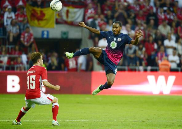 - LIEGE, BELGIUM: Standard d Francois Marquet and Xanthi s Julian Bobby De Guzman fight for the ball during the return leg game of Belgian First Division soccer team Standard de Liege and Greek team Skoda Xanthi in the third qualifying round of the UEFA Europa League in Liege, Thursday 08 August 2013. YORICKxJANSENS x45120164x