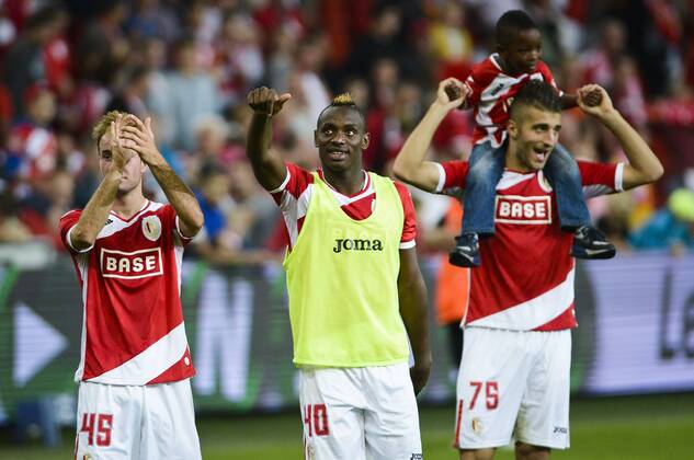 - LIEGE, BELGIUM: Standard d Francois Marquet, Standard s Paul-Jose Mpoku Ebunge and Standard s Alpasian Ozturk celebrate after winning a soccer game between Belgian First Division soccer team Standard de Liege and Belarus soccer team FC Minsk, the return leg of the Play-offs of the Europa League competition in Liege, Belgium, Thursday 29 August 2013. Standard won the first leg 0-2. LAURIExDIEFFEMBACQ x45519892x