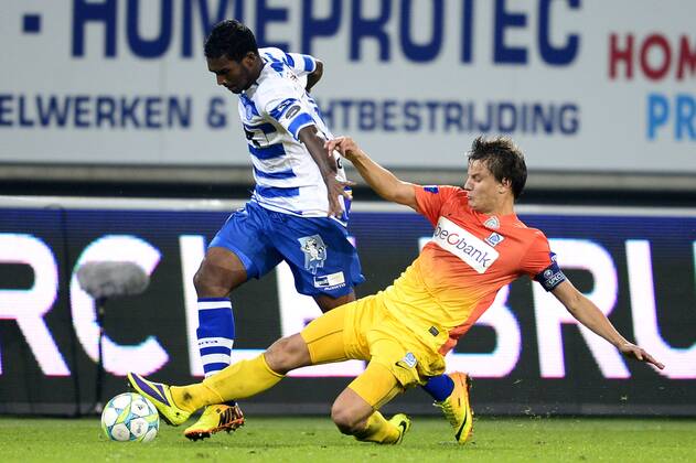 - GENT, BELGIUM: Gent s Renato Neto and Genk s Jelle Vossen fight for the ball during the Jupiler Pro League match between KAA Gent and KRC Genk, in Gent, Sunday 06 October 2013, on day 10 of the Belgian soccer championship. YORICKxJANSENS x47802198x