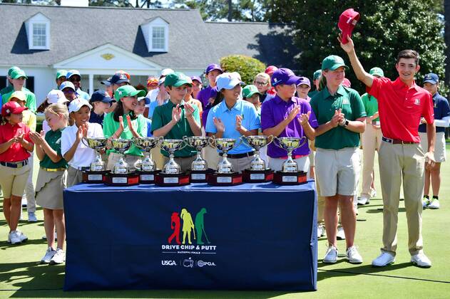 The winners of the Drive Chip & Putt National Finals pose together at Augusta National Golf Club during Masters week on April 1, 2018 in Augusta, Georgia.  AUG20180401317 KEVINxDIETSCH
