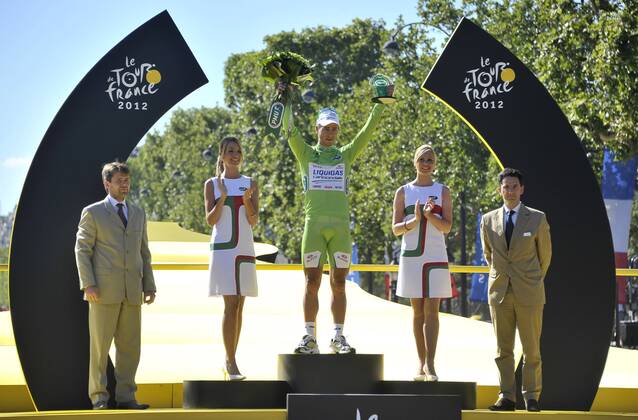 - PARIS, FRANCE: Slovakian Peter Sagan of Liquigas-Cannondale celebrates on the podium in the green jersey of leader in the sprint ranking after the 20th and last stage of the 99th edition of the Tour de France cycling race, 130km from Rambouillet to the Champs-Elysees, Paris, France, Sunday 22 July 2012. NICOLASxBOUVY x36717831x