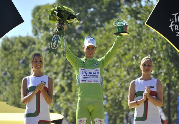 - PARIS, FRANCE: Slovakian Peter Sagan of Liquigas-Cannondale celebrates on the podium in the green jersey of leader in the sprint ranking after the 20th and last stage of the 99th edition of the Tour de France cycling race, 130km from Rambouillet to the Champs-Elysees, Paris, France, Sunday 22 July 2012. NICOLASxBOUVY x36717877x
