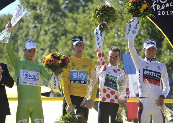 - PARIS, FRANCE: Slovakian Peter Sagan of Liquigas-Cannondale with the green jersey, British Bradley Wiggins of Sky Procycling Team with the yellow jersey, French Thomas Voeckler of Europcar with the white jersey with red dots (polka-dot) and US Tejay Van Garderen of BMC Racing Team with the white Jersey pictured on the podium after the 20th and last stage of the 99th edition of the Tour de France cycling race, 130km from Rambouillet to the Champs-Elysees, Paris, France, Sunday 22 July 2012. NICOLASxBOUVY x36717906x
