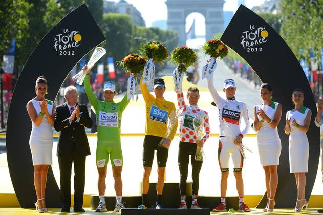 - PARIS, FRANCE: Slovakian Peter Sagan of Liquigas-Cannondale with the green jersey (3 L), British Bradley Wiggins of Sky Procycling Team with the yellow jersey (C), French Thomas Voeckler of Europcar with the white jersey with red dots (polka-dot) (C R) and US Tejay Van Garderen of BMC Racing Team (3 R) with the white Jersey pictured on the podium after the 20th and last stage of the 99th edition of the Tour de France cycling race, 130km from Rambouillet to the Champs-Elysees, Paris, France, Sunday 22 July 2012. NICOLASxBOUVY x36718224x