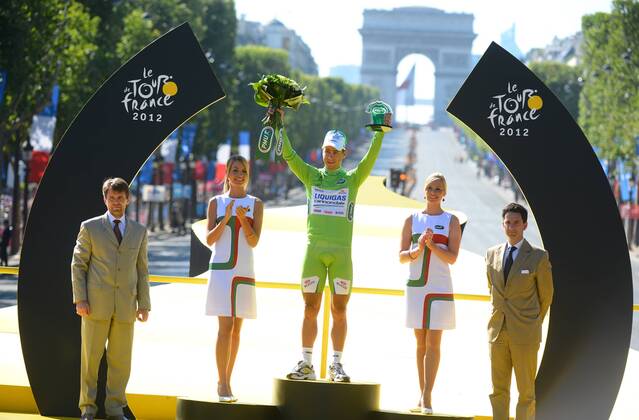 - PARIS, FRANCE: Slovakian Peter Sagan of Liquigas-Cannondale celebrates on the podium in the green jersey of leader in the sprint ranking after the 20th and last stage of the 99th edition of the Tour de France cycling race, 130km from Rambouillet to the Champs-Elysees, Paris, France, Sunday 22 July 2012. NICOLASxBOUVY x36718239x