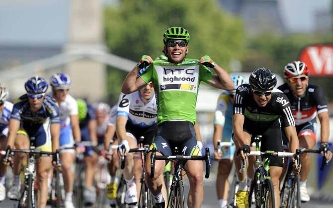 - PARIS, FRANCE: Holder of the green jersey of leader in the sprint ranking British Mark Cavendish of Team HTC - High Road celebrates as he crosses the finish line after the twenty first and final stage of the Tour de France cycling race, from Creteil to Paris (95km), in France, Sunday 24 July 2011. The 98th Tour de France ends on the Champs-Elysees in Paris today. ERICxLALMAND  x28358957x