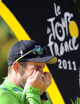 - PARIS, FRANCE: Holder of the green jersey of leader in the sprint ranking British Mark Cavendish of Team HTC - High Road celebrates on the podium after the twenty first and final stage of the Tour de France cycling race, from Creteil to Paris (95km), in France, Sunday 24 July 2011. The 98th Tour de France ends on the Champs-Elysees in Paris today. DIRKxWAEM  x28359363x
