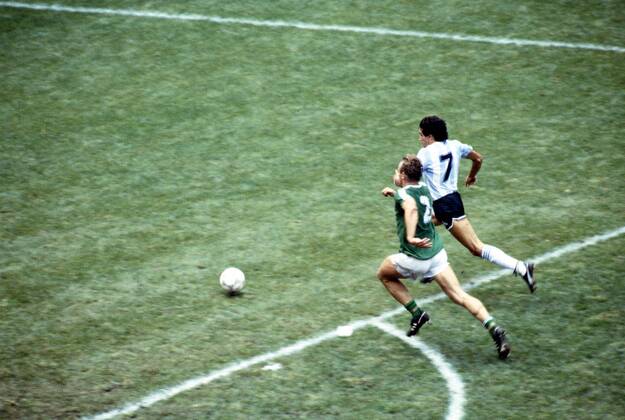 FIFA World Cup WM Weltmeisterschaft Fussball - Mexico 1986 29.6.1986, Estadio Azteca, Mexico, D.F. Final Argentina v West Germany. Jorge Burruchaga runs away to score the winner for Argentina, Hans-Peter Briegel of West Germany is late. 3-2 in the 84th minute. Noxthirdxpartyxsales  (75100419)