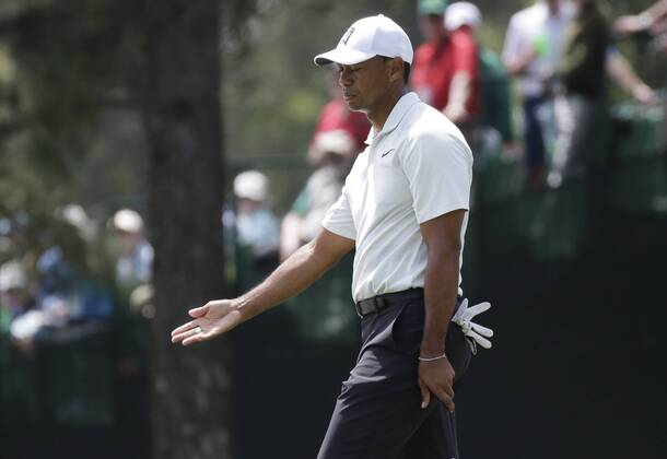 Tiger Woods reacts after a putt on the first hole in the 2nd round of the 2018 Masters Tournament at the Augusta National Golf Club in Augusta, Georgia, on April 6, 2018.  AUG20180406126 JOHNxANGELILLO