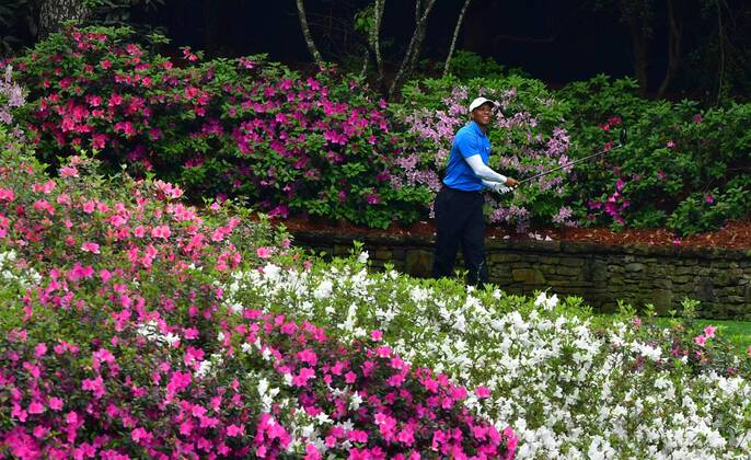 Tiger Woods watches his hit off of the 13th tee during the third round of the 2018 Masters Tournament at the Augusta National Golf Club in Augusta, Georgia, on April 7, 2018.  AUG20180407312 KEVINxDIETSCH