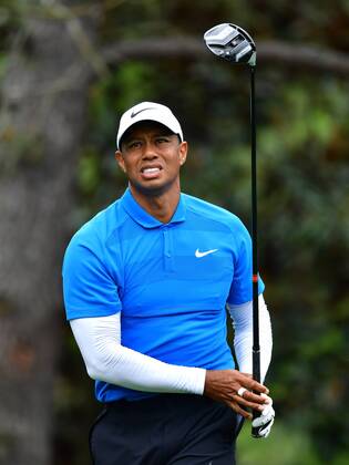 Tiger Woods watches his drive off of the 15th tee during the third round of the 2018 Masters Tournament at the Augusta National Golf Club in Augusta, Georgia, on April 7, 2018.  AUG20180407318 KEVINxDIETSCH