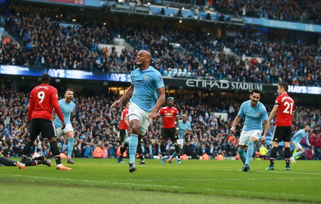 Vincent Kompany of Manchester City celebrates scoring the first goal during the premier league match at the Etihad Stadium, Manchester. Picture date 7th April 2018. Picture credit should read: Simon Bellis Sportimage EDITORIAL USE ONLY. No use with unauthorised audio, video, data, fixture lists, club league logos or live services. Online in-match use limited to 120 images, no video emulation. No use in betting, games or single club league player publications.