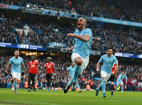 Vincent Kompany of Manchester City celebrates scoring the first goal during the premier league match at the Etihad Stadium, Manchester. Picture date 7th April 2018. Picture credit should read: Simon Bellis Sportimage EDITORIAL USE ONLY. No use with unauthorised audio, video, data, fixture lists, club league logos or live services. Online in-match use limited to 120 images, no video emulation. No use in betting, games or single club league player publications.