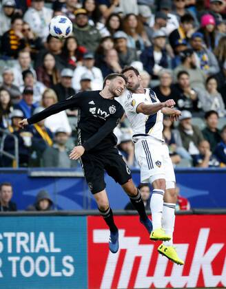 April 8, 2018 - Los Angeles, California, U.S - Sporting Kansas Citys midfielder Ilie Sanchez (6) of Spain, and Los Angeles Galaxys forward Chris Pontius (19) battle for a head ball during the 2018 Major League Soccer MLS Fussball Herren USA match between Los Angeles Galaxy and Sporting Kansas City in Carson, California, April 8, 2018. Sporting Kansas City won 2-0. MLS 2018: Los Angeles Galaxy 0-2 Sporting Kansas City - ZUMAc68_ 20180408_zaf_c68_038 Copyright: xRingoxChiux