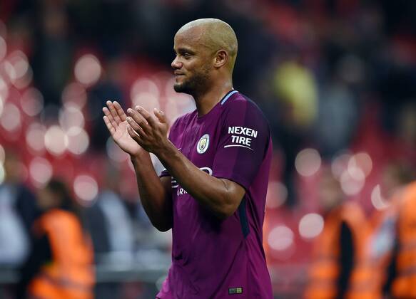 Vincent Kompany of Manchester City celebrates at the end of the premier league match at the Wembley Stadium, London. Picture date 14th April 2018. Picture credit should read: Robin Parker Sportimage EDITORIAL USE ONLY. No use with unauthorised audio, video, data, fixture lists, club league logos or live services. Online in-match use limited to 120 images, no video emulation. No use in betting, games or single club league player publications. HIP_1516