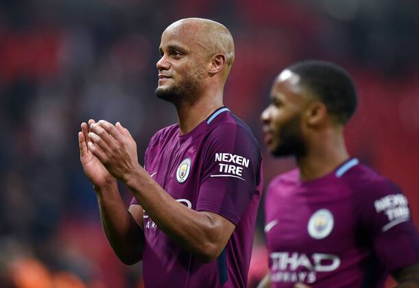 Vincent Kompany of Manchester City celebrates at the end of the premier league match at the Wembley Stadium, London. Picture date 14th April 2018. Picture credit should read: Robin Parker Sportimage EDITORIAL USE ONLY. No use with unauthorised audio, video, data, fixture lists, club league logos or live services. Online in-match use limited to 120 images, no video emulation. No use in betting, games or single club league player publications. HIP_1561
