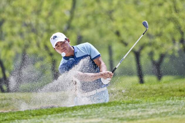 Wu Ashun of China competes in the third round of the 2018 Volvo China Open golf tournament in Beijing, China, 28 April 2018. Golf players heats up third round of 2018 Volvo China Open  20180428_47157