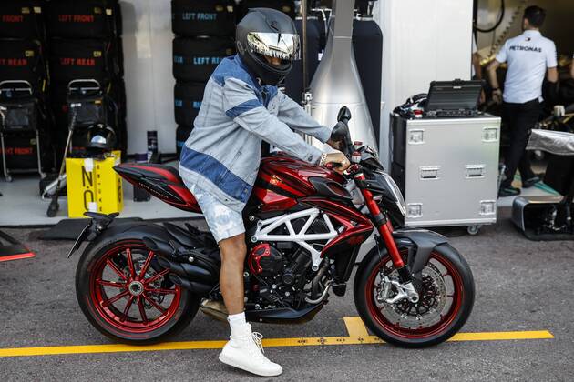 May 23, 2018 - Montecarlo, Monaco - 44 Lewis Hamilton from Great Britain Mercedes W09 Hybrid EQ Power+ team Mercedes GP with his MV Agusta motorbike during the Monaco Formula One Grand Prix at Monaco on 23th of May, 2018 in Montecarlo, Monaco. F1 Grand Prix of Monaco - Previews - ZUMAn230 20180523_zaa_n230_1452 Copyright: xXavierxBonillax
