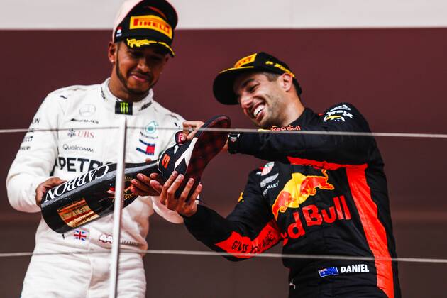 May 27, 2018 - Montecarlo, Monaco - 44 Lewis Hamilton from Great Britain Mercedes W09 Hybrid EQ Power+ team Mercedes GP helping the winner 03 Daniel Ricciardo from Australia with Aston Martin Red Bull Tag Heuer RB14 to do a showy during the Race of Monaco Formula One Grand Prix at Monaco on 27th of May, 2018 in Montecarlo, Monaco. F1 Grand Prix of Monaco - ZUMAn230 20180527_zaa_n230_652 Copyright: xXavierxBonillax