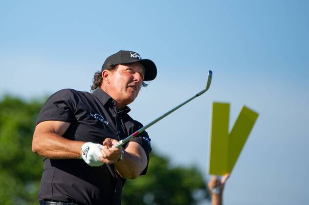 Phil Mickelson hits his drive from the 11th tee in the first round of the 118th U.S. Open Championship at Shinnecock Hills Golf Club in Southampton, New York on June 14, 2018.  NYP20180614121 COREYxSIPKIN