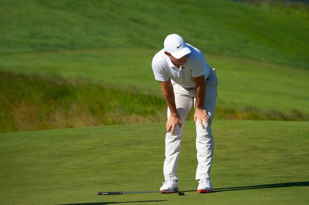 Rory McIlroy from Northern Ireland reacts to missing a putt on the 11th green in the first round of the 118th U.S. Open Championship at Shinnecock Hills Golf Club in Southampton, New York on June 14, 2018.  NYP20180614125 COREYxSIPKIN
