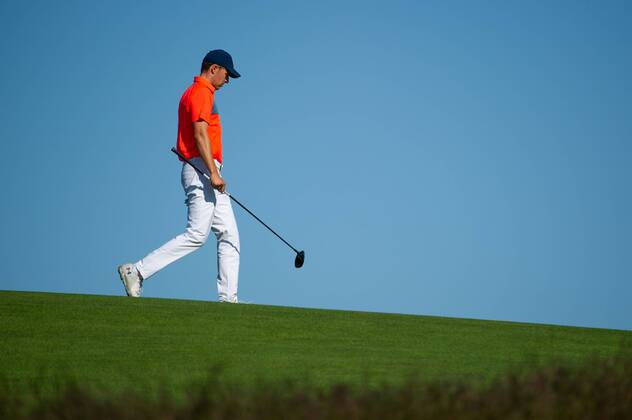 Jordan Spieth walks on 12th fairway in the first round of the 118th U.S. Open Championship at Shinnecock Hills Golf Club in Southampton, New York on June 14, 2018.  NYP20180614127 COREYxSIPKIN