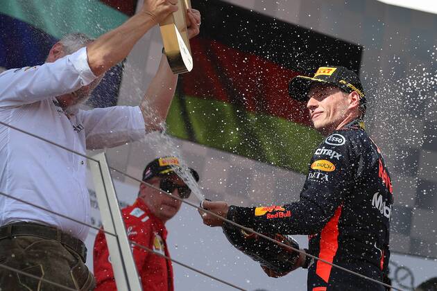 FORMULA 1 - GP of Austria 2018 SPIELBERG,AUSTRIA,01.JUL.18 - MOTORSPORTS - Grand Prix of Austria, Red Bull Ring. Image shows the rejoicing of Max Verstappen (NED Red Bull Racing). Keywords: champaign. GEPAxpictures xChristianxWalgram