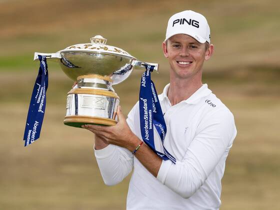 15th July 2018, Gullane Golf Club, Gullane, Scotland; Aberdeen Investments Scottish Open Golf, 4th round; Brandon Stone with the Aberdeen Investments Scottish Open Golf Trophy after winning with a score of -20  ActionPlus12048170 AlanxRennie