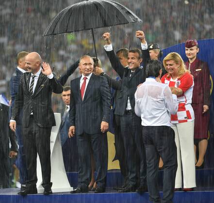 (180715) -- MOSCOW, July 15, 2018 -- FIFA President Gianni Infantino (1st L, front), Russian President Vladimir Putin (2nd L, front), French President Emmanuel Macron (3rd L, front) and Croatian President Kolinda Grabar-Kitarovic attend the awarding ceremony after the 2018 FIFA World Cup WM Weltmeisterschaft Fussball final match between France and Croatia in Moscow, Russia, July 15, 2018. France defeated Croatia 4-2 and claimed the title. ) (SP)RUSSIA-MOSCOW-2018 WORLD CUP-FINAL-FRANCE VS CROATIA LiuxDawei
