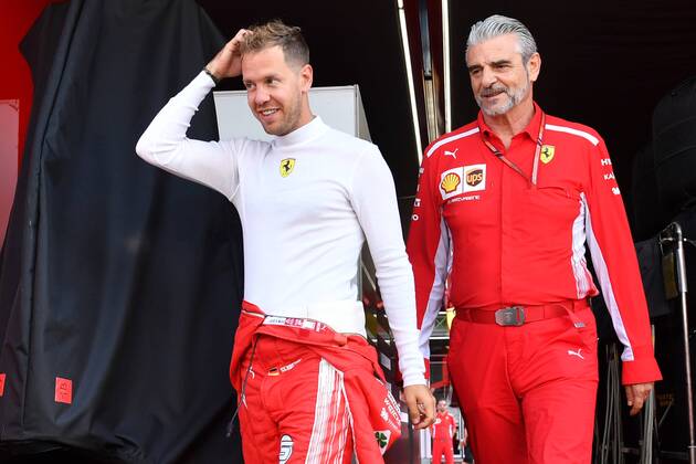 Sebastian VETTEL,GER (Scuderia Ferrari), mit Ferrari Teamchef Maurizio Arrivabene (ITA) auf dem Weg zur Box. Training, Formel 1:GP von DeutschlandDeutschland,Hockenheimring,Saison 2018,am 20.07.2018.