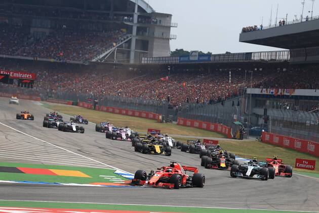 22nd July 2018, Hockenheimring, Hockenheim, Germany; German Formula One Grand Prix, Race Day; Scuderia Ferrari, Sebastian Vettel leads Bottas into Turn 1 after race start  ActionPlus12049692 Octane