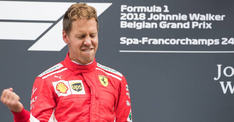 Ferrari s German driver Sebastian Vettel celebrates on the podium after winning the Spa-Francorchamps Formula One Grand Prix of Belgium race, in Spa-Francorchamps, Sunday 26 August 2018. BENOITxDOPPAGNE x05414417x