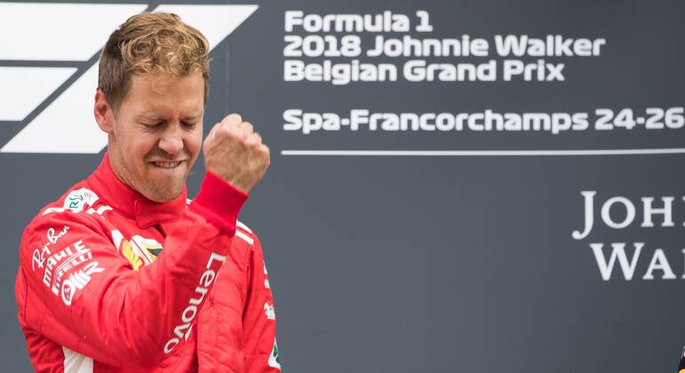 Ferrari s German driver Sebastian Vettel celebrates on the podium after winning the Spa-Francorchamps Formula One Grand Prix of Belgium race, in Spa-Francorchamps, Sunday 26 August 2018. BENOITxDOPPAGNE x05414418x