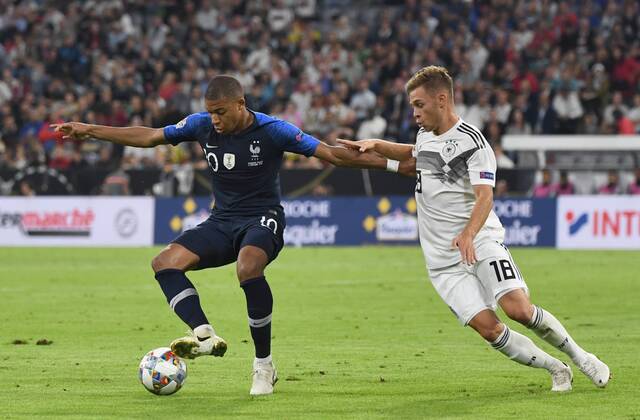 Fussball, Herren, Saison 2018 19, Nations League, Länderspiel in München, Deutschland - Frankreich (0:0), v. l. Kylian Mbappe (Frankreich), Joshua Kimmich (Deutschland), 06.09.2018, Copyright: xMatthiasxKochx