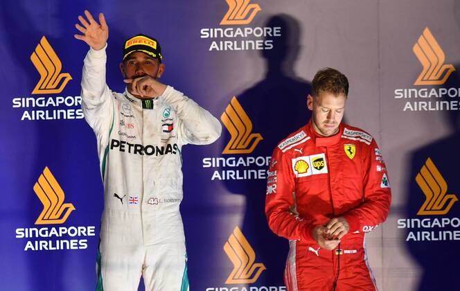 Lewis Hamilton; Mercedes Grand Prix, Sebastian Vettel, Scuderia Ferrari, frustriert, formula 1 GP, Singapore, 16.09.2018 Photo:mspb Jerry Andre Lewis Hamilton; Sebastian Vettel, frustriert, formula 1 GP, Singapore 2018