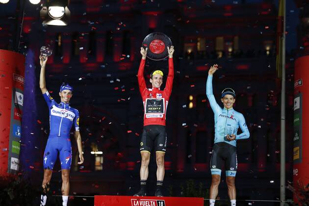 Spanish Enric Mas of Quick-Step Floors, Britain s Simon Yates of Mitchelton - Scott and Spanish Miguel Angel Lopez of Astana Pro Team celebrate on the podium after the 21st and final stage of the Vuelta a Espana , Tour of Spain cycling race, 100,9km from Alcorcon to Madrid, Spain, Sunday 16 September 2018. FRANCE OUT YUZURUxSUNADA  x05427699x