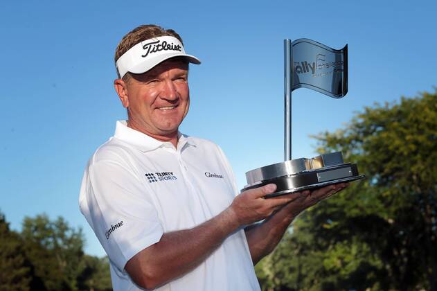 September 16, 2018 - Grand Blanc, Michigan, United States - Paul Broadhurst of England holds up the trophy after winning The Ally Challenge presented by McLaren at Warwick Hills Golf & Country Club in Grand Blanc, MI, USA Sunday, September 16, 2018. The Ally Challenge - Final Round  - ZUMAn230 20180916_zaa_n230_983 Copyright: xJorgexLemusx