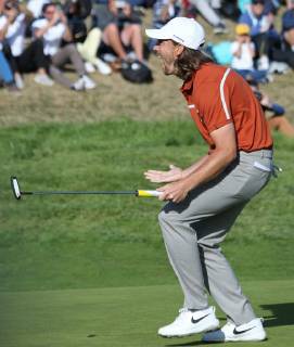 Tommy Fleetwood reacts after making a putt on the 9th green on day two of the Ryder Cup at Le Golf National in Guyancourt near Paris on September 29, 2018. Fleetwood and teammate Francesco Molinari won the 9th hole against Tiger Woods and Bryson DeChambeau.  PAR20180929032 DAVIDxSILPA