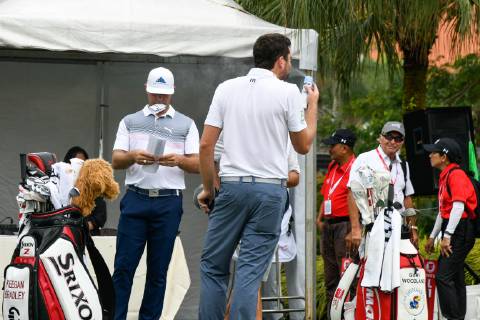 October 11, 2018 - Kuala Lumpur, Malaysia - Keegan Bradley of United States spraying his face with sunblock spray during first round of the CIMB Classic at TPC Kuala Lumpur on 11 October, 2018 in Kuala Lumpur, Malaysia CIMB Classic - Round One  - ZUMAn230 20181011_zaa_n230_093 Copyright: xChrisxJungx