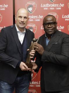 This year s winner Genk s head coach Philippe Clement and Basile Boli pose for the photographer with the trophy at the eighth edition of the Raymond Goethals award, for the coach whose style was the closest to the style of Raymond Goethals, Monday 03 December 2018, in Brussels. THIERRYxROGE  x05481842x