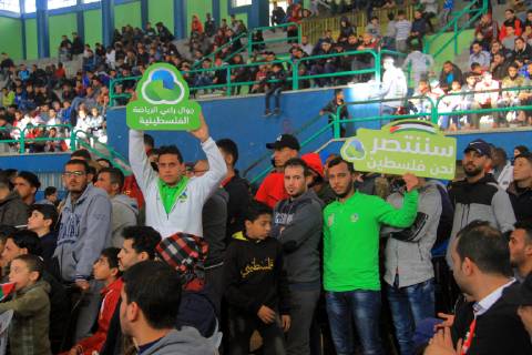 January 11, 2019 - Rafah, Gaza Strip, Palestinian Territory - Palestinian fans watch the 2019 AFC Asian Cup Group B football match between Palestine and Australia, in Rafah in the souhtern Gaza Strip on January 11, 2019. The match ended in 3-0 to Australia Middle East News - January 11, 2019 - ZUMAap3_ 88356656st Copyright: xAlixHamadx