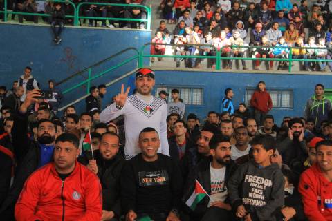 January 11, 2019 - Rafah, Gaza Strip, Palestinian Territory - Palestinian fans watch the 2019 AFC Asian Cup Group B football match between Palestine and Australia, in Rafah in the souhtern Gaza Strip on January 11, 2019. The match ended in 3-0 to Australia Middle East News - January 11, 2019 - ZUMAap3_ 88356739st Copyright: xAlixHamadx