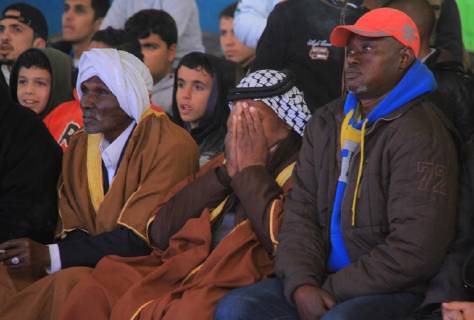 January 11, 2019 - Rafah, Gaza Strip, Palestinian Territory - Palestinian fans watch the 2019 AFC Asian Cup Group B football match between Palestine and Australia, in Rafah in the souhtern Gaza Strip on January 11, 2019. The match ended in 3-0 to Australia Middle East News - January 11, 2019 - ZUMAap3_ 88356741st Copyright: xAlixHamadx