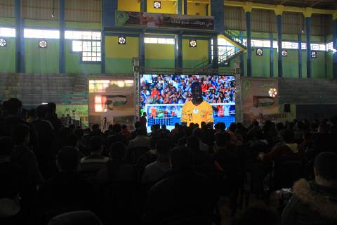 January 11, 2019 - Rafah, Gaza Strip, Palestinian Territory - Palestinian fans watch the 2019 AFC Asian Cup Group B football match between Palestine and Australia, in Rafah in the souhtern Gaza Strip on January 11, 2019. The match ended in 3-0 to Australia Middle East News - January 11, 2019 - ZUMAap3_ 88356744st Copyright: xAlixHamadx