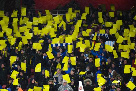 Football - 2018 2019 Premier League - Arsenal vs. Cardiff City Banners and yellow daffodil cards in support of Emiliano Sala the missing player, at The Emirates. COLORSPORT ASHLEY WESTERN