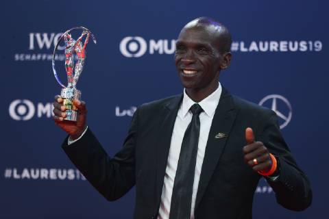 (190219) -- MONACO, Feb. 19, 2019 -- Kenyan athlete Eliud Kipchoge shows the trophy after winning the Academy Exceptional Achievement Award at the 2019 Laureus World Sports Awards ceremony in Monaco, Feb. 18, 2019. The 2019 Laureus World Sports Awards were unveiled in Monaco on Monday. ) (SP)MONACO-WORLD SPORTS AWARDS ZhengxHuansong 