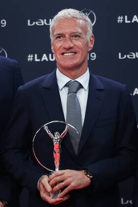 (190219) -- MONACO, Feb. 19, 2019 -- Didier Deschamps, manager of the French men s national football team, shows the trophy after the France World Cup team winning the Team of the Year award at the 2019 Laureus World Sports Awards ceremony in Monaco, Feb. 18, 2019. The 2019 Laureus World Sports Awards were unveiled in Monaco on Monday. ) (SP)MONACO-WORLD SPORTS AWARDS ZhengxHuansong 